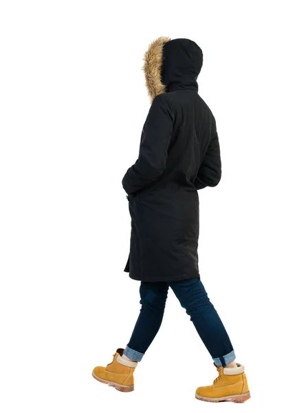 Walking   woman in parka. - Stock-foto