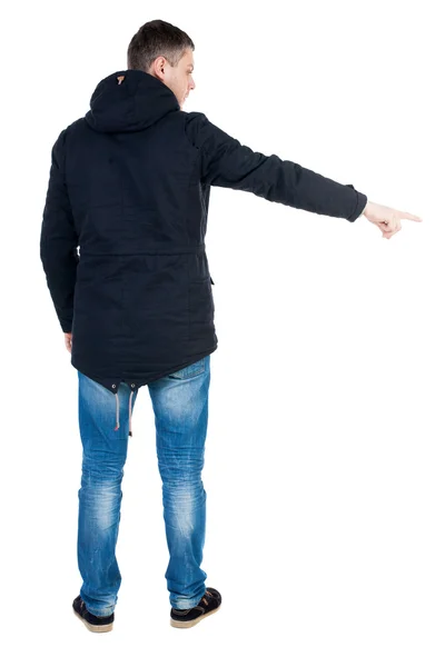 Pointing man in parka. — Stock Photo, Image