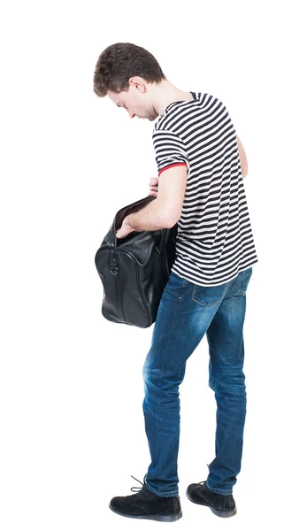 Homem de jeans com saco — Fotografia de Stock