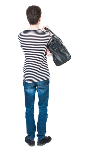 Мужчина в джинсах с сумкой — стоковое фото