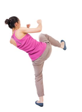 athletic  woman kick foot