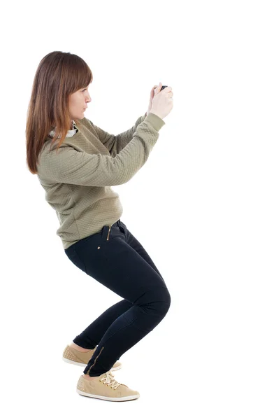 Back view of woman photographing. — Stock Photo, Image