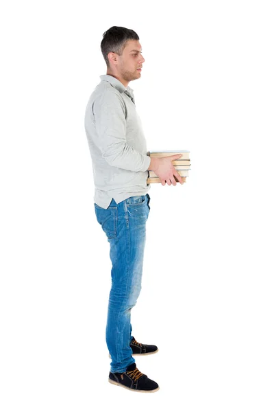 Man carries stack of books. — Stock Photo, Image