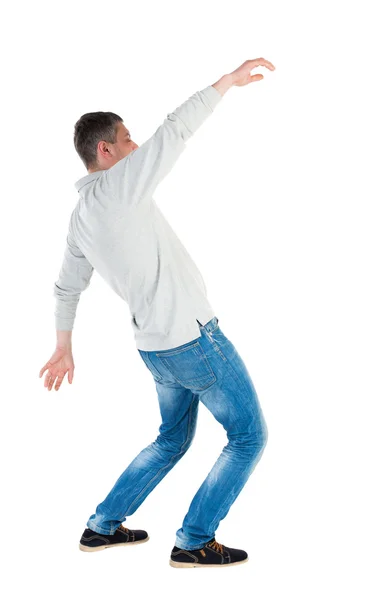 Back view man Balances — Stockfoto