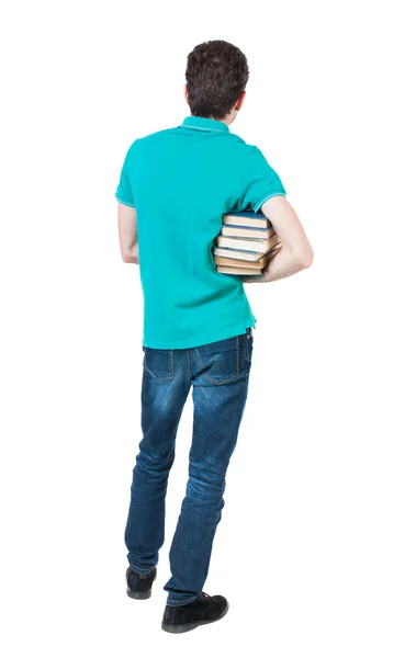 Man carries heavy pile of books. — Stock Photo, Image