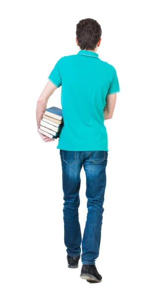 Pohledný muž nese Stoh knih. — Stock fotografie