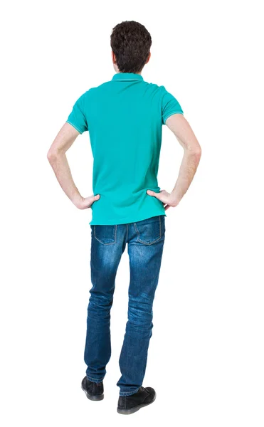 Вид сзади человека в джинсах — стоковое фото