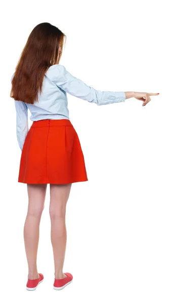 Back view of  pointing woman. — Stock Photo, Image