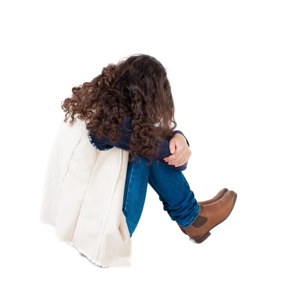 Curly girl sitting and crying. — Stock Photo, Image