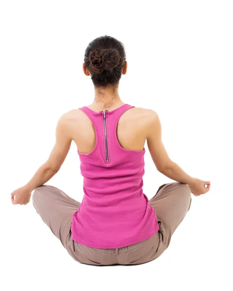 Woman sitting in lotus position — Stock Photo, Image