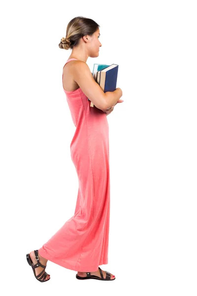 Meisje draagt boeken — Stockfoto