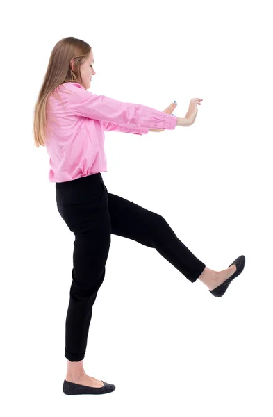 Woman pushes wall. — Stock Photo, Image