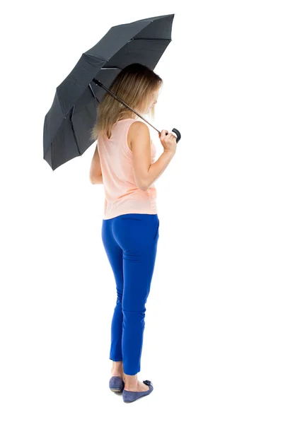 Νεαρή γυναίκα κάτω από μια ομπρέλα — Φωτογραφία Αρχείου