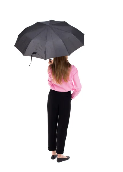 Jovem mulher sob um guarda-chuva — Fotografia de Stock