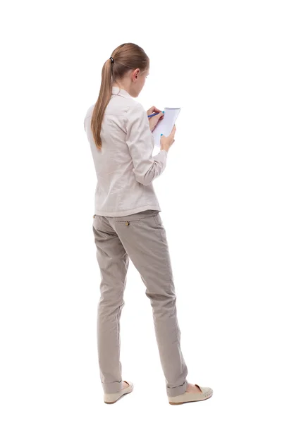 Woman takes notes — Stock Photo, Image