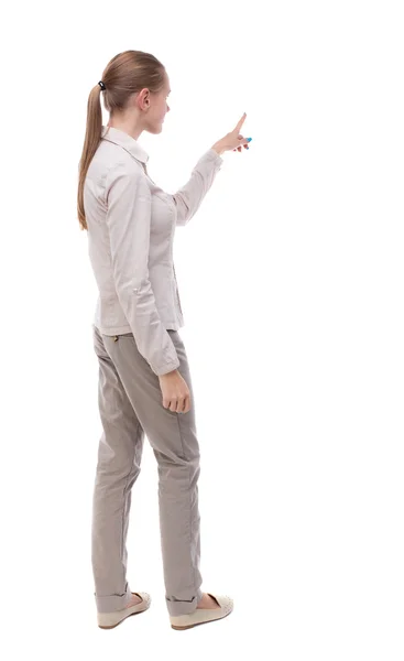 Back view of pointing woman — Stock Photo, Image