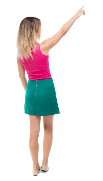 Back view of  pointing woman. — Stock Photo, Image