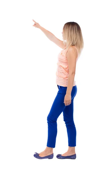 Back view of pointing woman — Stock Photo, Image