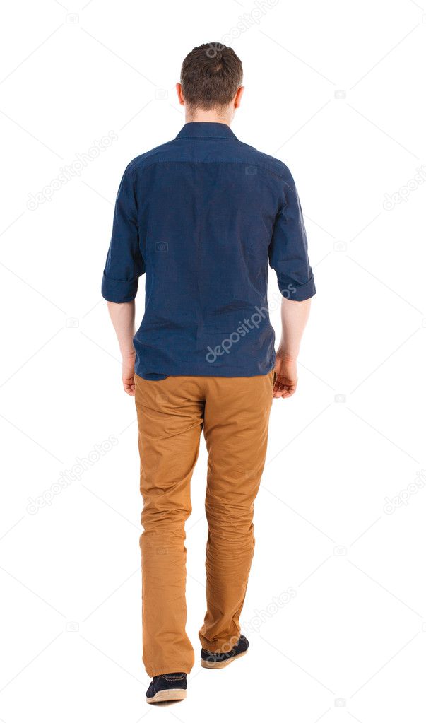man in jeans and a shirt.