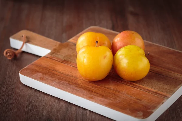 Fresh juicy golden plums — Stock Photo, Image