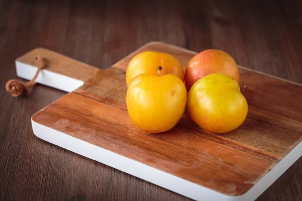 Fresh juicy golden plums — Stock Photo, Image