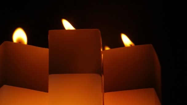 Reflection rotating candles on the black top — Stock Footage Reflection rotating candles on the black top Video Clip