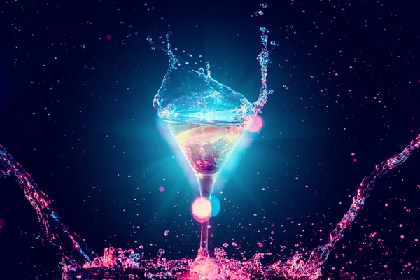 Colourful cocktail in glass with splash — Stock Photo, Image