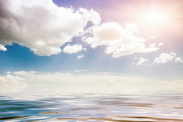 Sea and cloudy blue sky — Stock Photo, Image