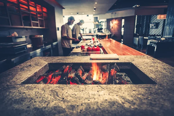 Modern restaurant with fireplace — Stock Photo, Image