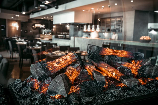 Modern restaurant with fireplace — Stock Photo, Image