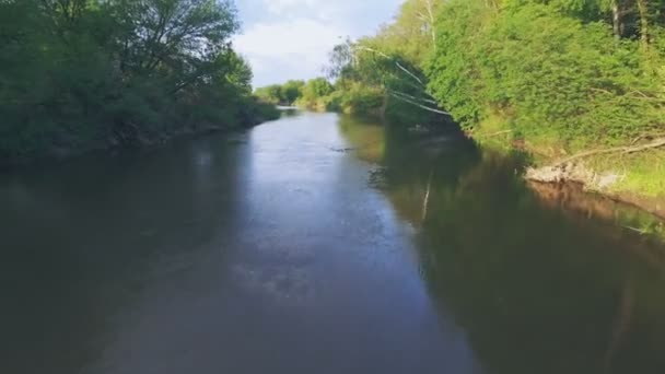 Girl in a blue kayak floating. Aerial video. Contact filming, copter soars up. 4k 30fps — Stock Video