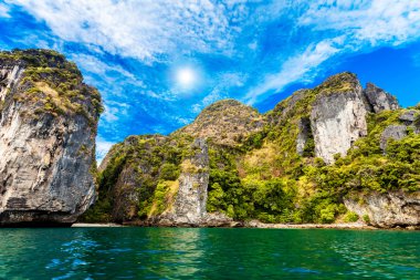 Cliffs and sea in Phi Phi islands clipart