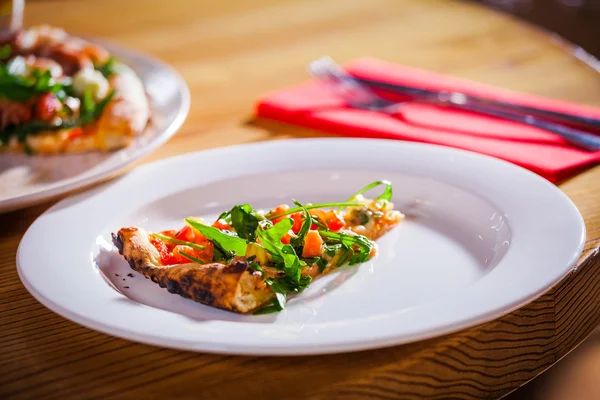 Delicious pizza on white plate — Stock Photo, Image