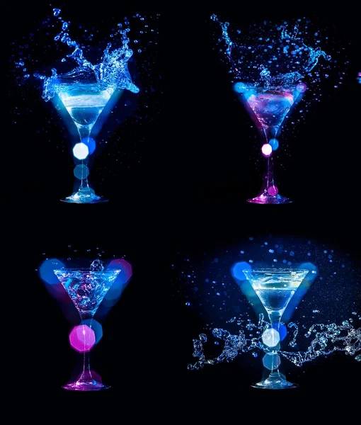 Splashes of cocktails in glasses — Stock Photo, Image