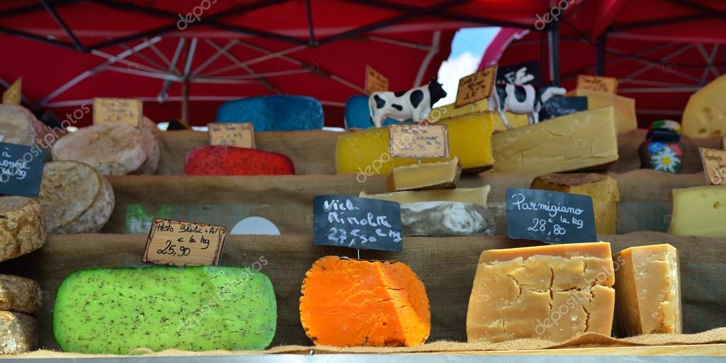 Cheese for sale on a French Market, Languedoc Roussillon region of the  south of France Stock Photo - Alamy