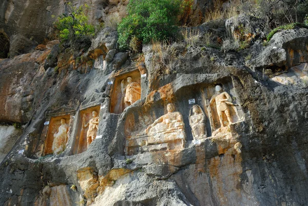 Адамкаялар - скальные резные фигуры. Турция — стоковое фото