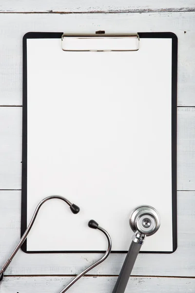 Workplace of doctor - stethoscope, medicine clipboard — Stock Photo, Image