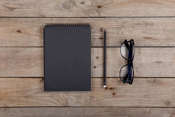 Notitieblok Bril Het Houten Bureau — Stockfoto