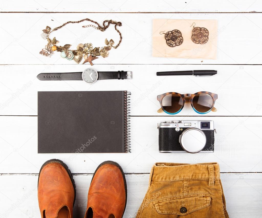 Tourism concept - set of camera, glasses, wathes, shoes etc