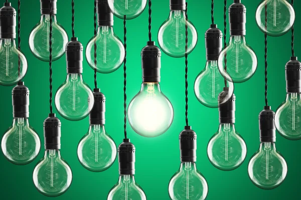 Idea e concetto di leadership Lampadine Edison incandescenti vintage accese — Foto Stock