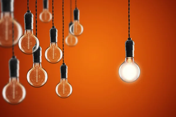 Idea y concepto de liderazgo Vintage bombillas incandescentes Edison en — Foto de Stock