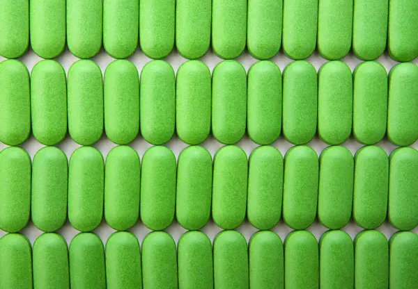 Verem a zöld tablettát — Stock Fotó