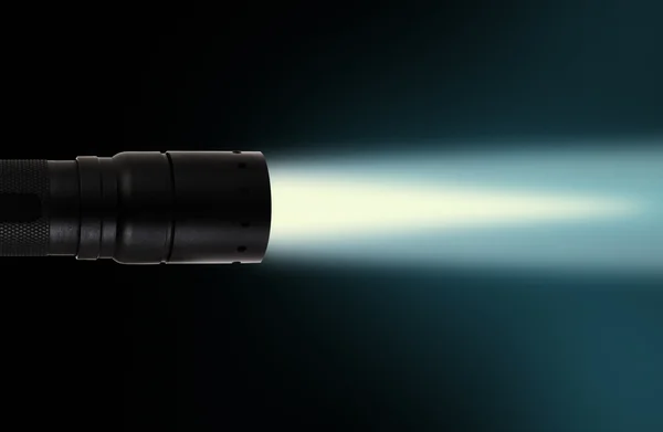 LED flashlight beam on black background — Stock Photo, Image