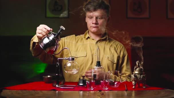 Process of tea in the siphon traditions of Asia — Stock Video