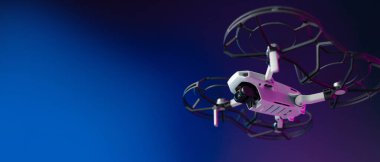 Küçük insansız hava aracı, odanın içinde neon bir arka planda uçarken pervanelerin koruması altında.