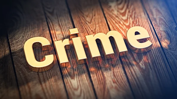 Parola Crimine su assi di legno — Foto Stock