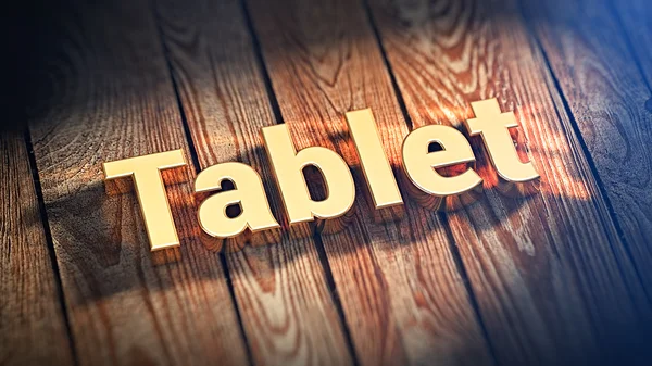 Λέξη Tablet σε ξύλινες σανίδες — Φωτογραφία Αρχείου