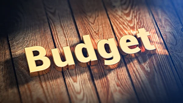 Slovo rozpočet na dřevo prkna — Stock fotografie