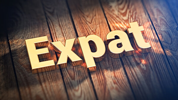 Word Expat on wood planks