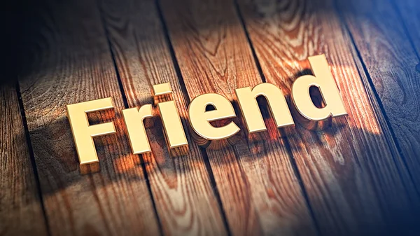 Slovo přítel na dřevo prkna — Stock fotografie